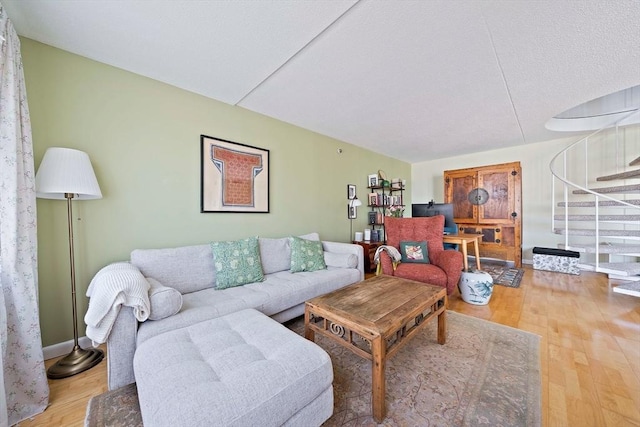 61 Broad Reach Unit T62B, Weymouth, MA 02191 - living area featuring wood finished floors, stairs, and baseboards