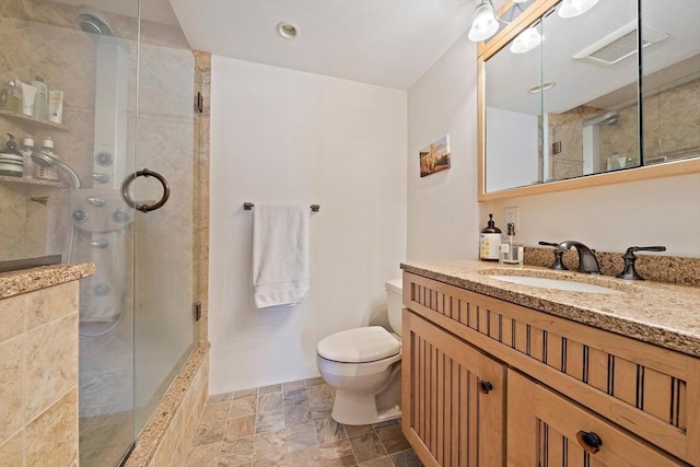 61 Broad Reach Unit T62B, Weymouth, MA 02191 - full bathroom with stone tile flooring, a shower stall, toilet, and vanity