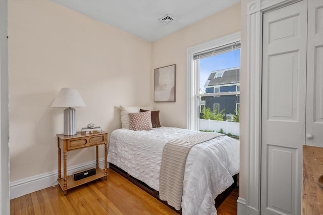 46 Farquhar Unit 2, Boston, MA 02131 - bedroom with light wood-style floors and baseboards