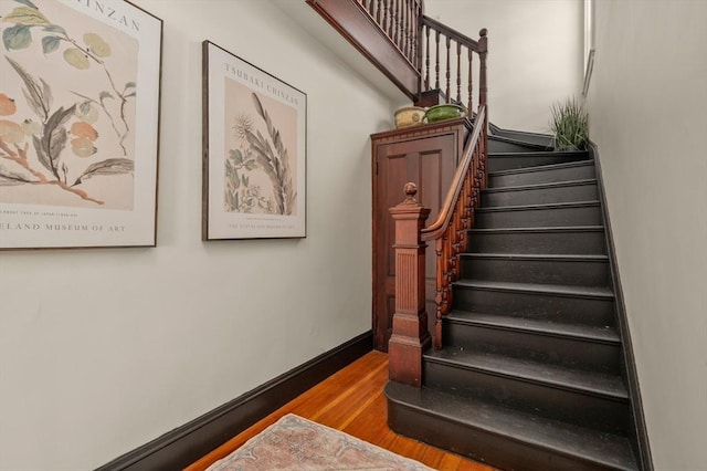 46 Farquhar Unit 2, Boston, MA 02131 - staircase featuring wood finished floors and baseboards