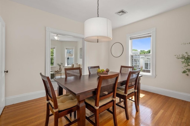46 Farquhar Unit 2, Boston, MA 02131 - dining space with plenty of natural light, light wood-style flooring, and baseboards