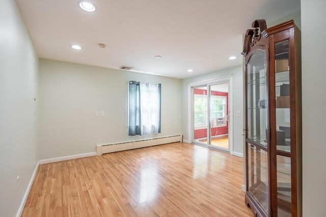 19 Zabelle Ave, Auburn, MA 01501 - spare room with a baseboard heating unit, baseboards, light wood finished floors, and recessed lighting