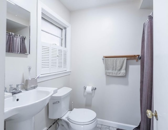 19 Zabelle Ave, Auburn, MA 01501 - full bathroom with toilet, baseboards, and a sink