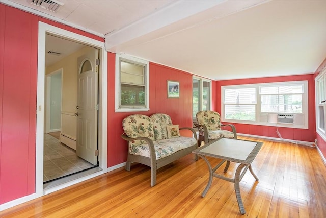 19 Zabelle Ave, Auburn, MA 01501 - sitting room featuring a baseboard radiator, light wood finished floors, cooling unit, and baseboards