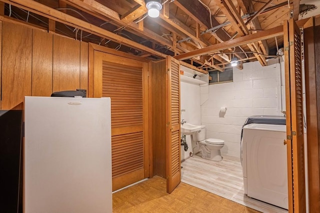 19 Zabelle Ave, Auburn, MA 01501 - finished basement with freestanding refrigerator, washer / clothes dryer, light wood-type flooring, and concrete block wall