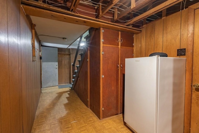 19 Zabelle Ave, Auburn, MA 01501 - finished basement with freestanding refrigerator, stairs, and wood walls