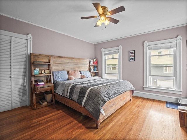 743 Bridge St, Lowell, MA 01850 - bedroom featuring wood finished floors, a ceiling fan, and crown molding