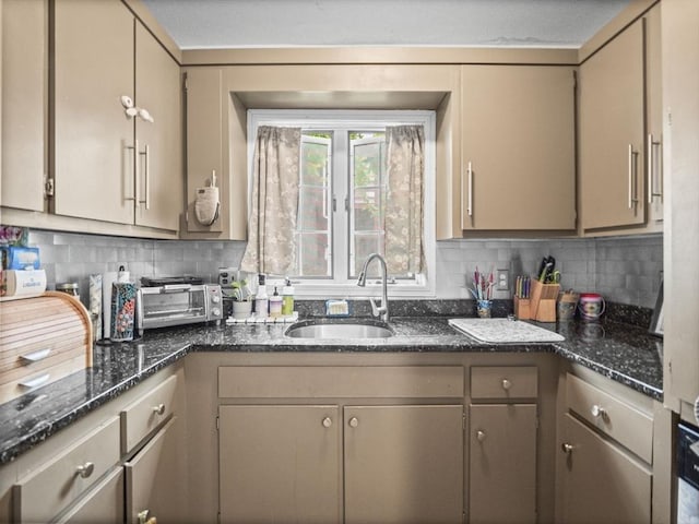 743 Bridge St, Lowell, MA 01850 - kitchen with decorative backsplash and dark stone counters