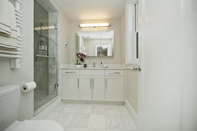 56 Commonwealth Ave Ph, Ph, Boston, MA 02116 - full bathroom with marble look tile flooring, toilet, vanity, a shower stall, and a towel warming rack