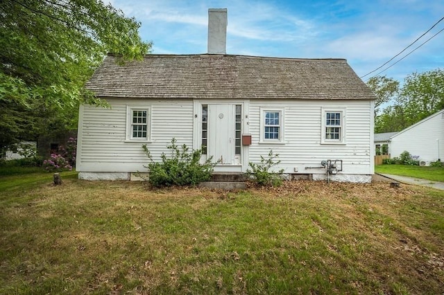 171 Hobart St, Danvers, MA 01923 - view of front of property with a front lawn and a chimney