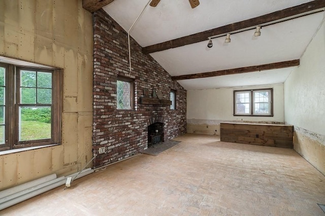 171 Hobart St, Danvers, MA 01923 - unfurnished living room featuring rail lighting and a fireplace