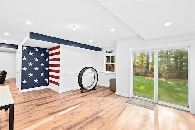 unfurnished living room with light wood-type flooring