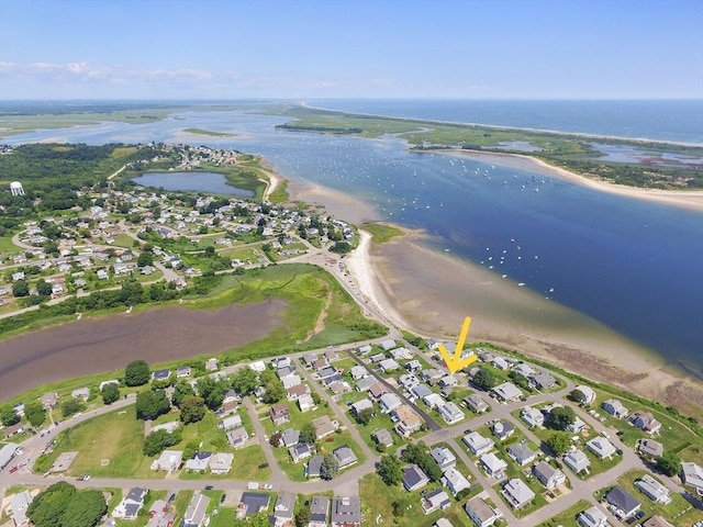 birds eye view of property featuring a water view and a residential view