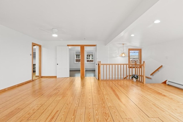 empty room with light wood-style flooring, baseboards, ceiling fan, and recessed lighting
