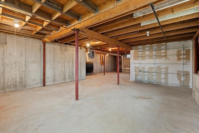 unfinished basement featuring heating fuel