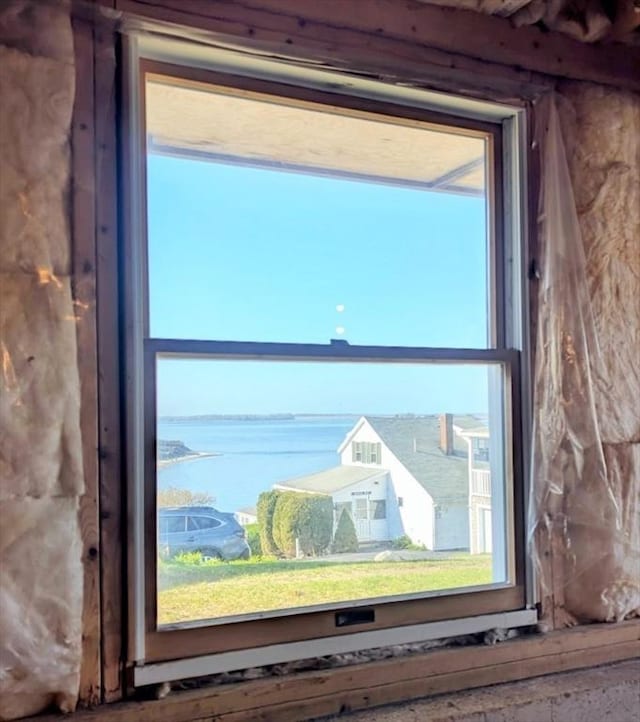 interior details featuring a water view
