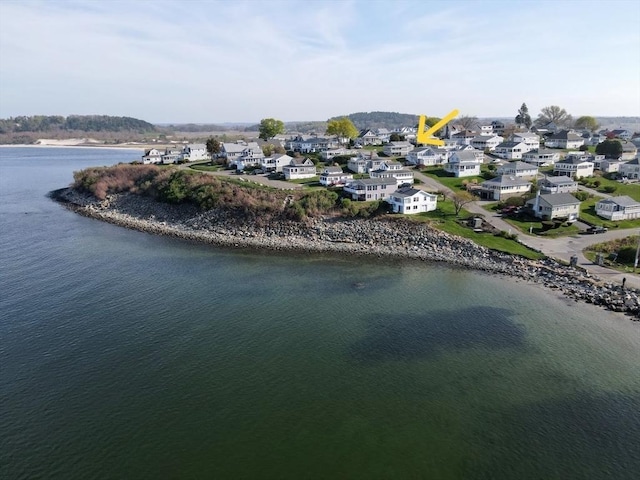 aerial view featuring a water view and a residential view
