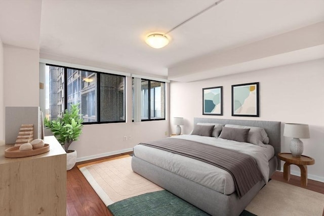 bedroom featuring dark hardwood / wood-style floors