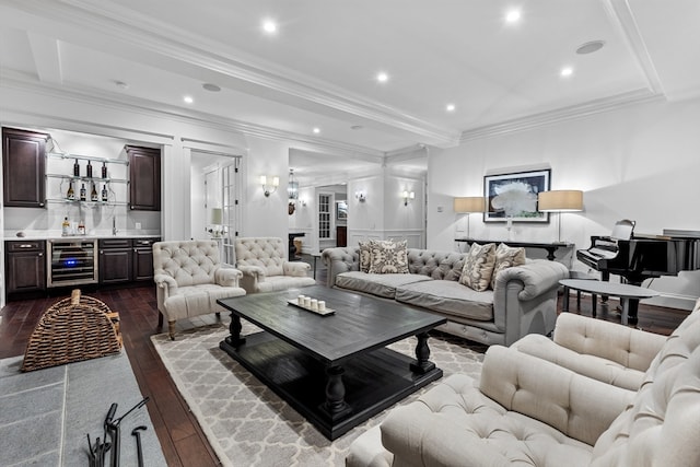 living room featuring wine cooler, crown molding, dark wood-type flooring, and beam ceiling