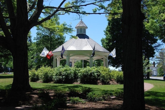 surrounding community featuring a lawn