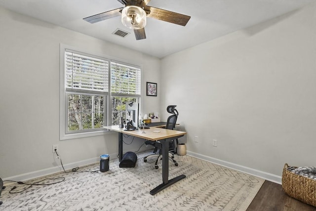 office featuring hardwood / wood-style flooring and ceiling fan