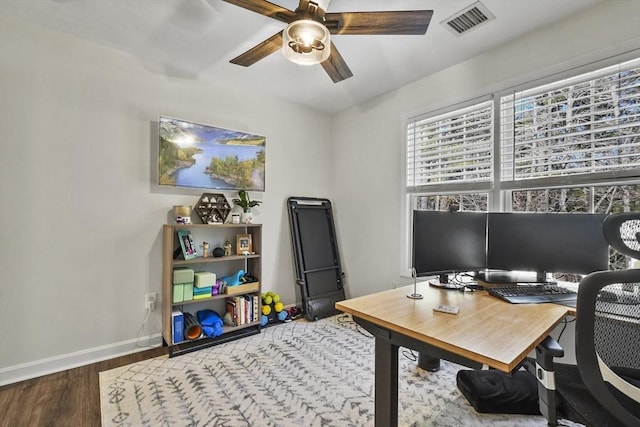 office area with wood-type flooring and ceiling fan