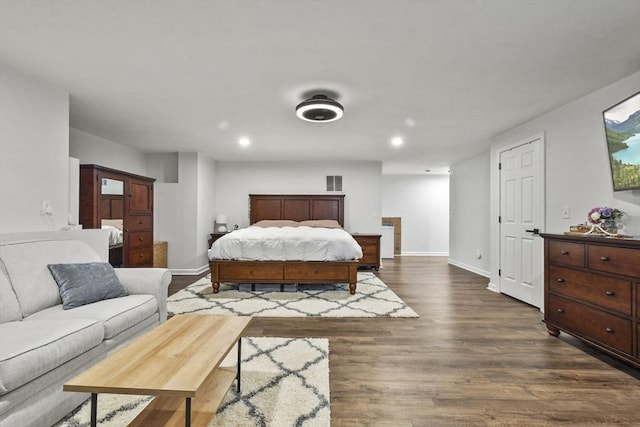 bedroom featuring dark wood-type flooring