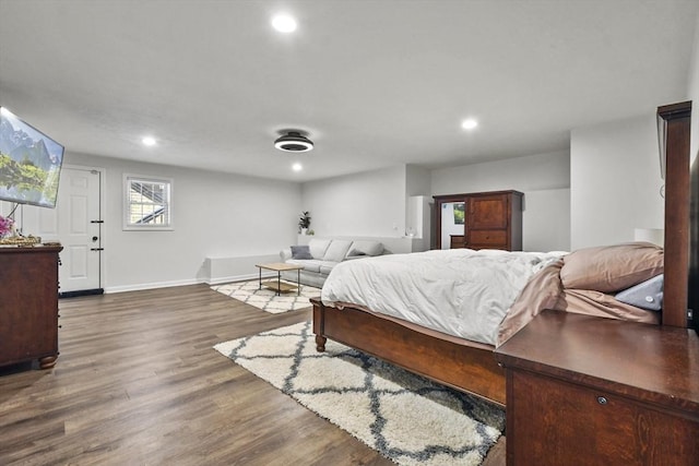 bedroom featuring dark wood-type flooring