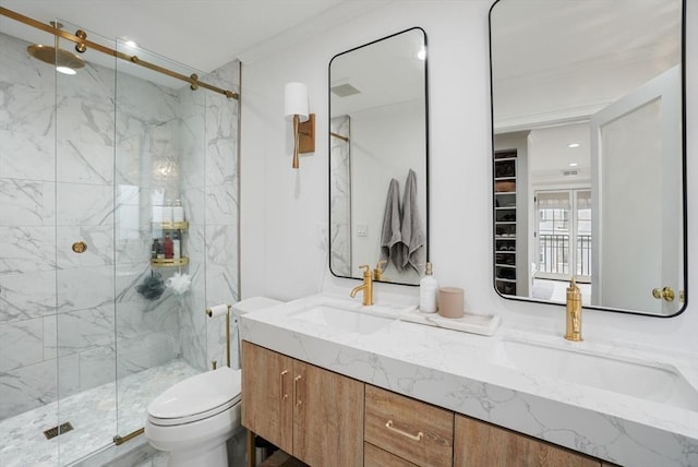 7 Newman St, Cambridge, MA 02140 - full bathroom with a marble finish shower, toilet, double vanity, and recessed lighting