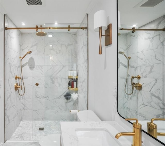 7 Newman St, Cambridge, MA 02140 - full bathroom featuring toilet, a marble finish shower, recessed lighting, and vanity