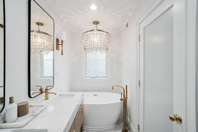 7 Newman St, Cambridge, MA 02140 - bathroom with a chandelier, a soaking tub, and vanity
