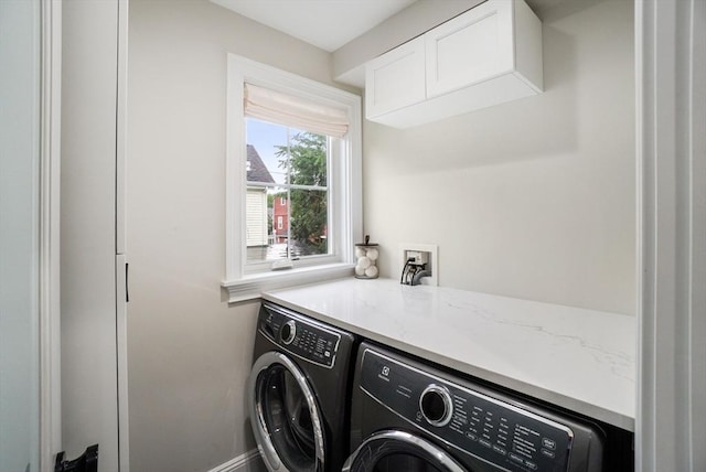 7 Newman St, Cambridge, MA 02140 - clothes washing area with washing machine and clothes dryer and cabinet space