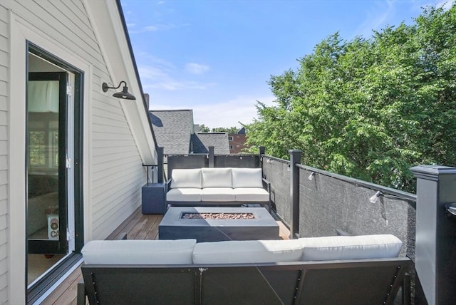 7 Newman St, Cambridge, MA 02140 - view of patio featuring a balcony and an outdoor living space with a fire pit