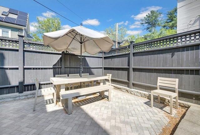 7 Newman St, Cambridge, MA 02140 - view of patio / terrace with outdoor dining area and a fenced backyard