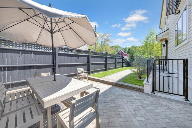 7 Newman St, Cambridge, MA 02140 - view of patio / terrace with outdoor dining space and a fenced backyard
