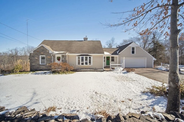 ranch-style home featuring a garage