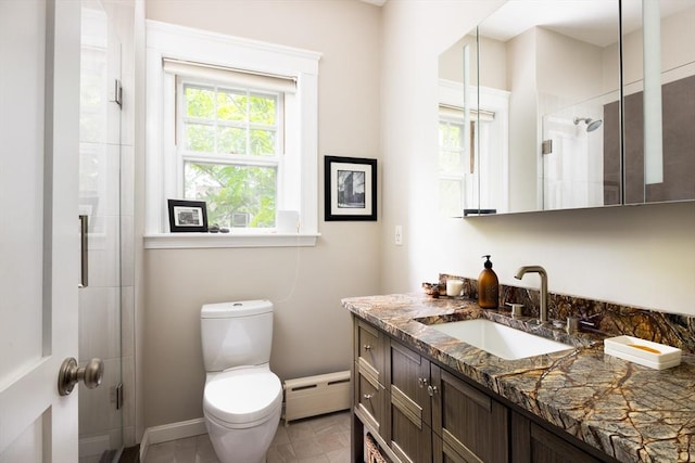 202 Fuller Unit 6, Brookline, MA 02446 - full bath featuring a baseboard radiator, vanity, toilet, an enclosed shower, and baseboards
