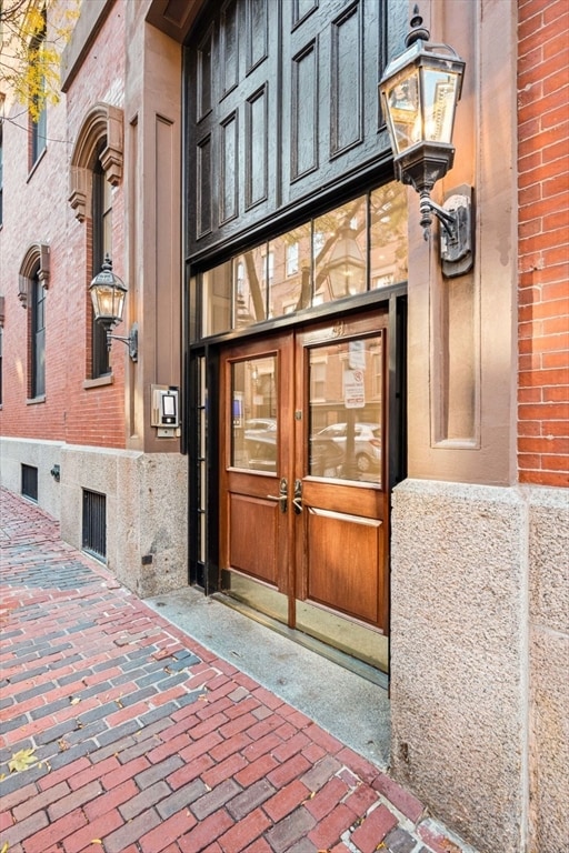 entrance to property featuring french doors