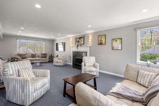57 Bouffard Dr, Marlborough, MA 01752 - carpeted living room featuring crown molding, recessed lighting, baseboards, and a fireplace