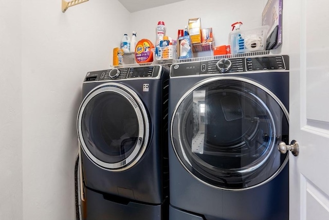 57 Bouffard Dr, Marlborough, MA 01752 - clothes washing area with separate washer and dryer and laundry area
