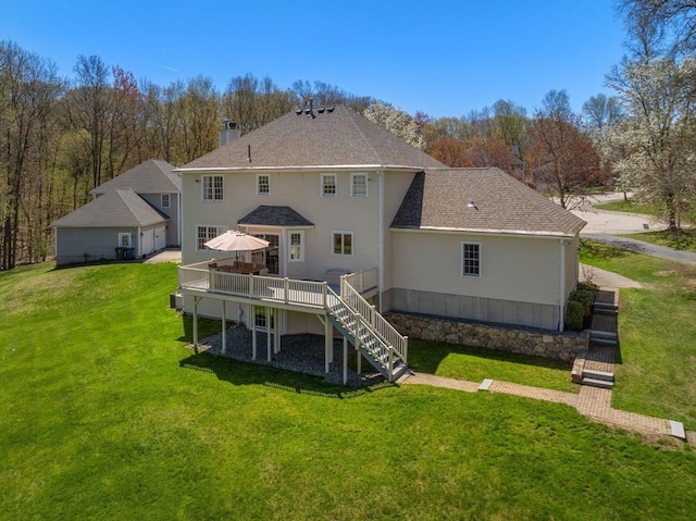 57 Bouffard Dr, Marlborough, MA 01752 - rear view of property with a yard, a wooden deck, stairs, and a chimney