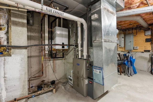 57 Bouffard Dr, Marlborough, MA 01752 - utility room featuring heating unit, tankless water heater, and electric panel