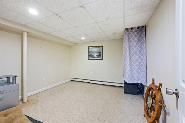 interior space with recessed lighting, baseboards, a paneled ceiling, and a baseboard radiator