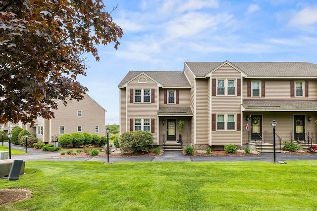 45 Washington St Unit B7, Methuen, MA 01844 - multi unit property with a front yard and roof with shingles