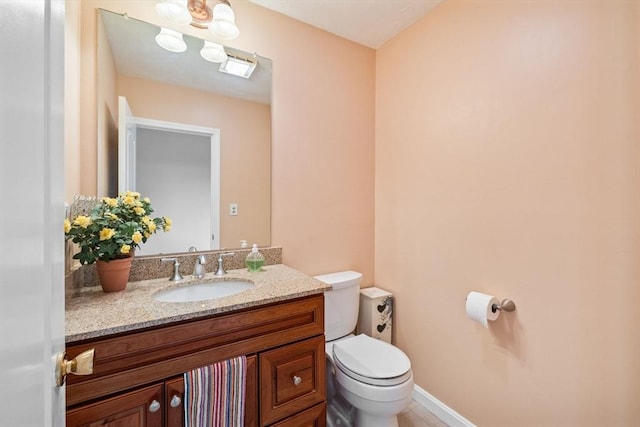 45 Washington St Unit B7, Methuen, MA 01844 - half bath featuring toilet, vanity, and baseboards