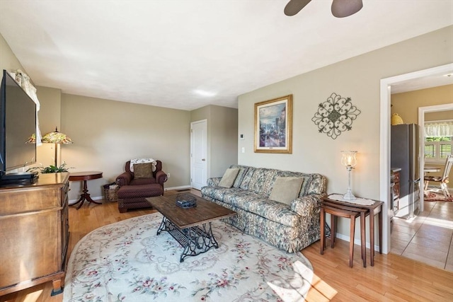 45 Washington St Unit B7, Methuen, MA 01844 - living area featuring light wood finished floors, ceiling fan, and baseboards