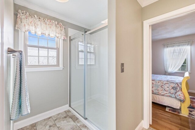45 Washington St Unit B7, Methuen, MA 01844 - full bath featuring a stall shower, crown molding, baseboards, and connected bathroom