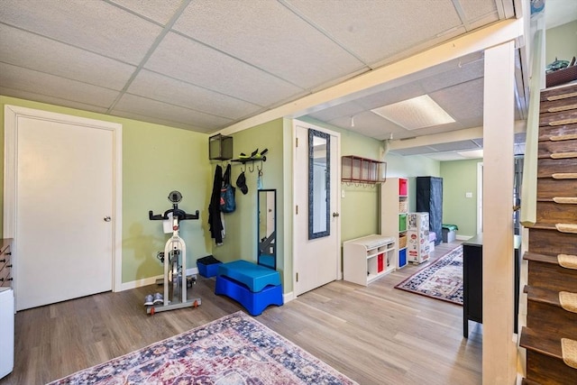 45 Washington St Unit B7, Methuen, MA 01844 - exercise room featuring wood finished floors, a paneled ceiling, and baseboards