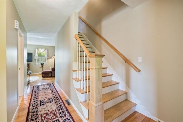 45 Washington St Unit B7, Methuen, MA 01844 - stairs featuring wood finished floors and baseboards