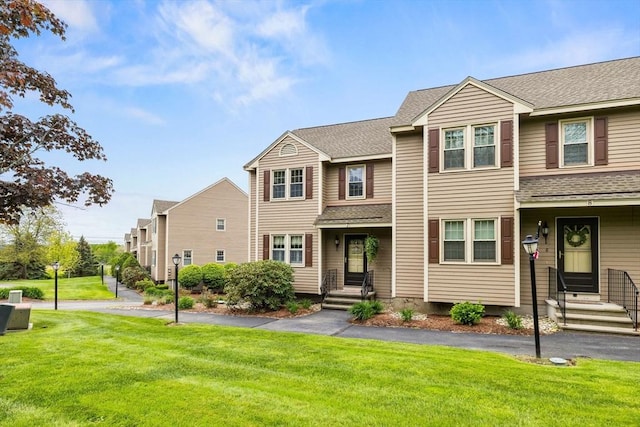 45 Washington St Unit B7, Methuen, MA 01844 - multi unit property with a front yard and roof with shingles